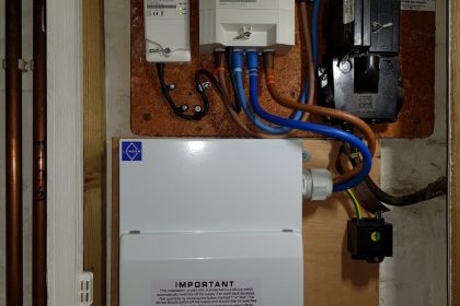 House B, Image 4. Completed installation of new fuse board with cover closed. 