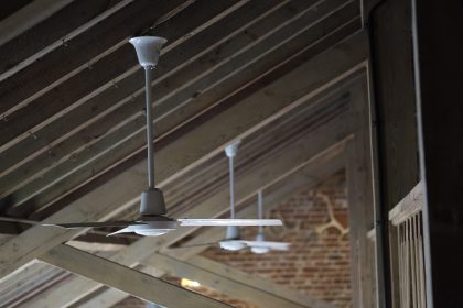 Electrical ceiling fans fixed to the roof joists at the Macknade Cafe, Faversham