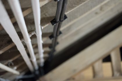 Trunking housing the electrical cables at the Macknade Cafe, Faversham runs neatly along the ceiling joists